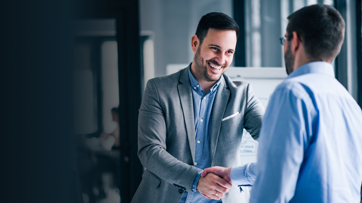 Limited company director meeting with a business adviser to discuss company tax and financial responsibilities.